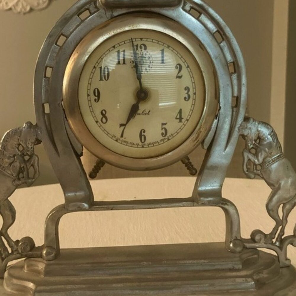 Metal horse clock.